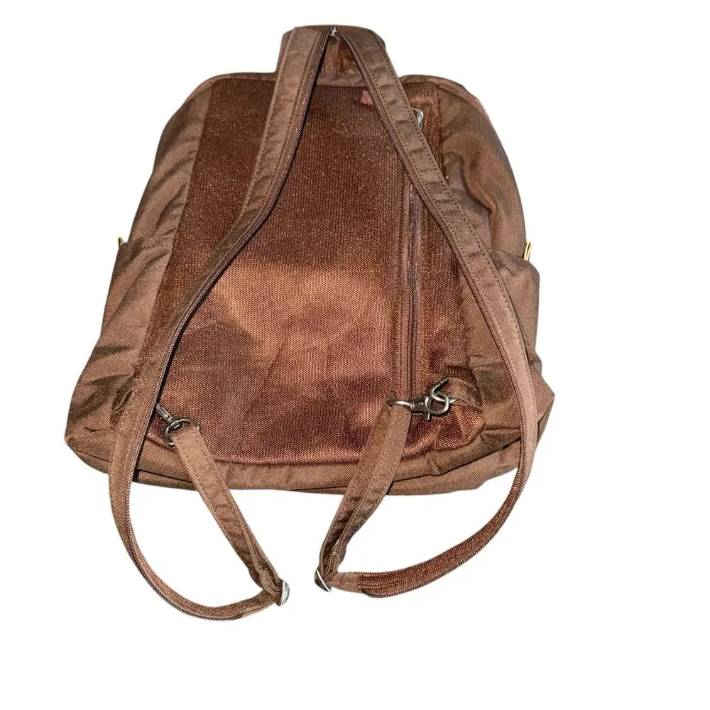 REI convertible backpack with Sling Zipper Brown w/silver hardware and pockets